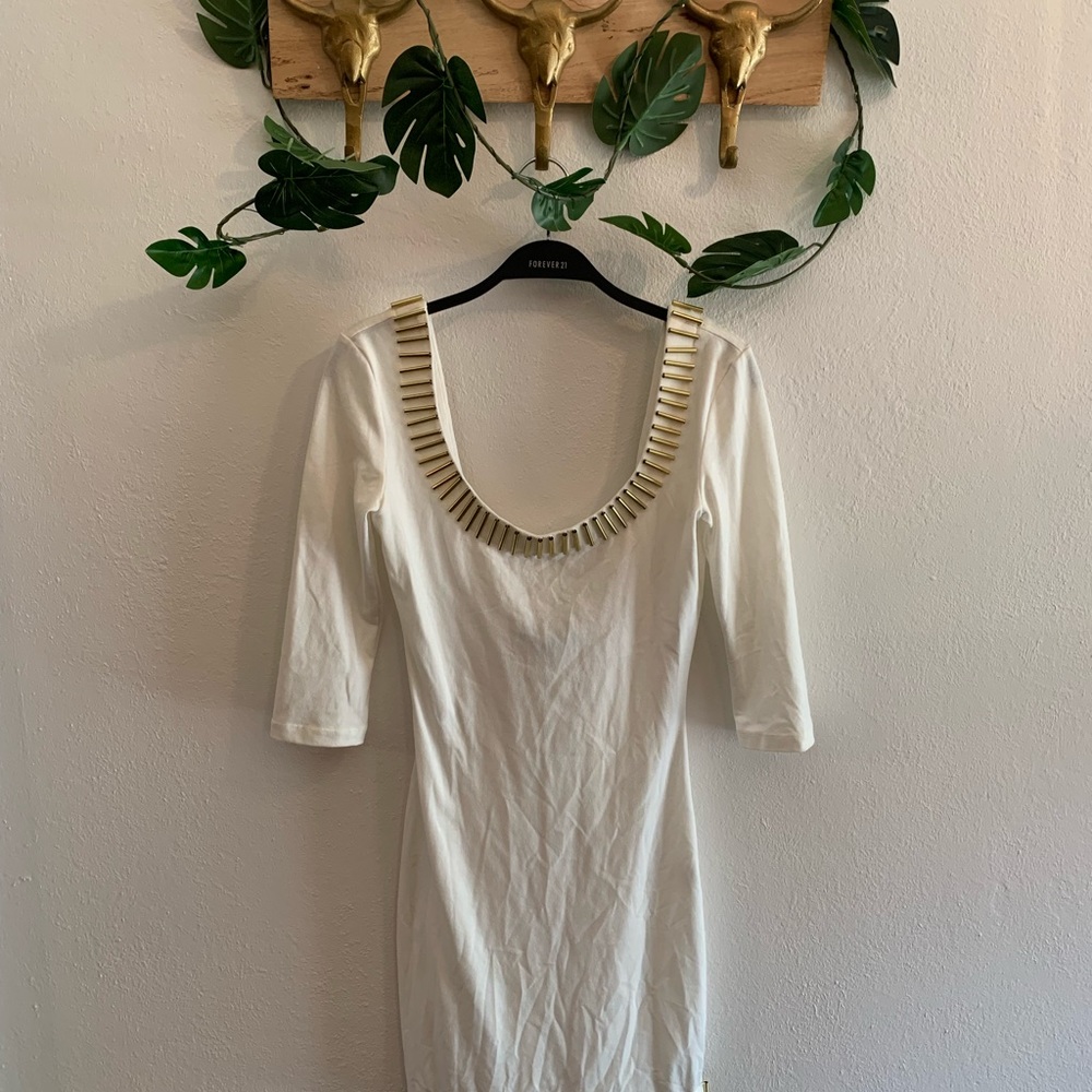 White dress with gold bead detailing